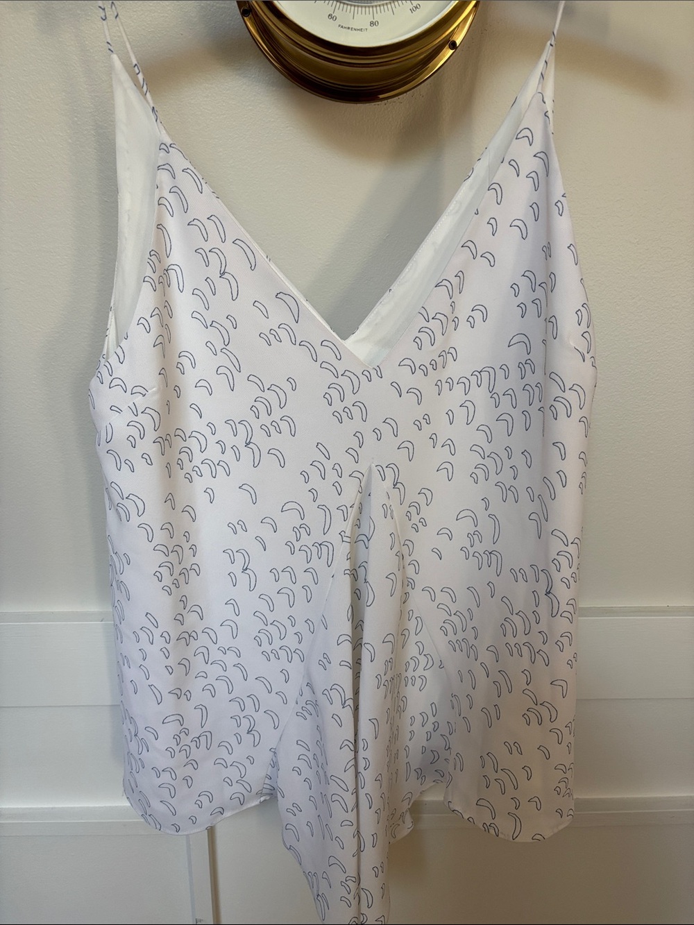white camisole features a deep V-neckline and a black crescent moon print nwt